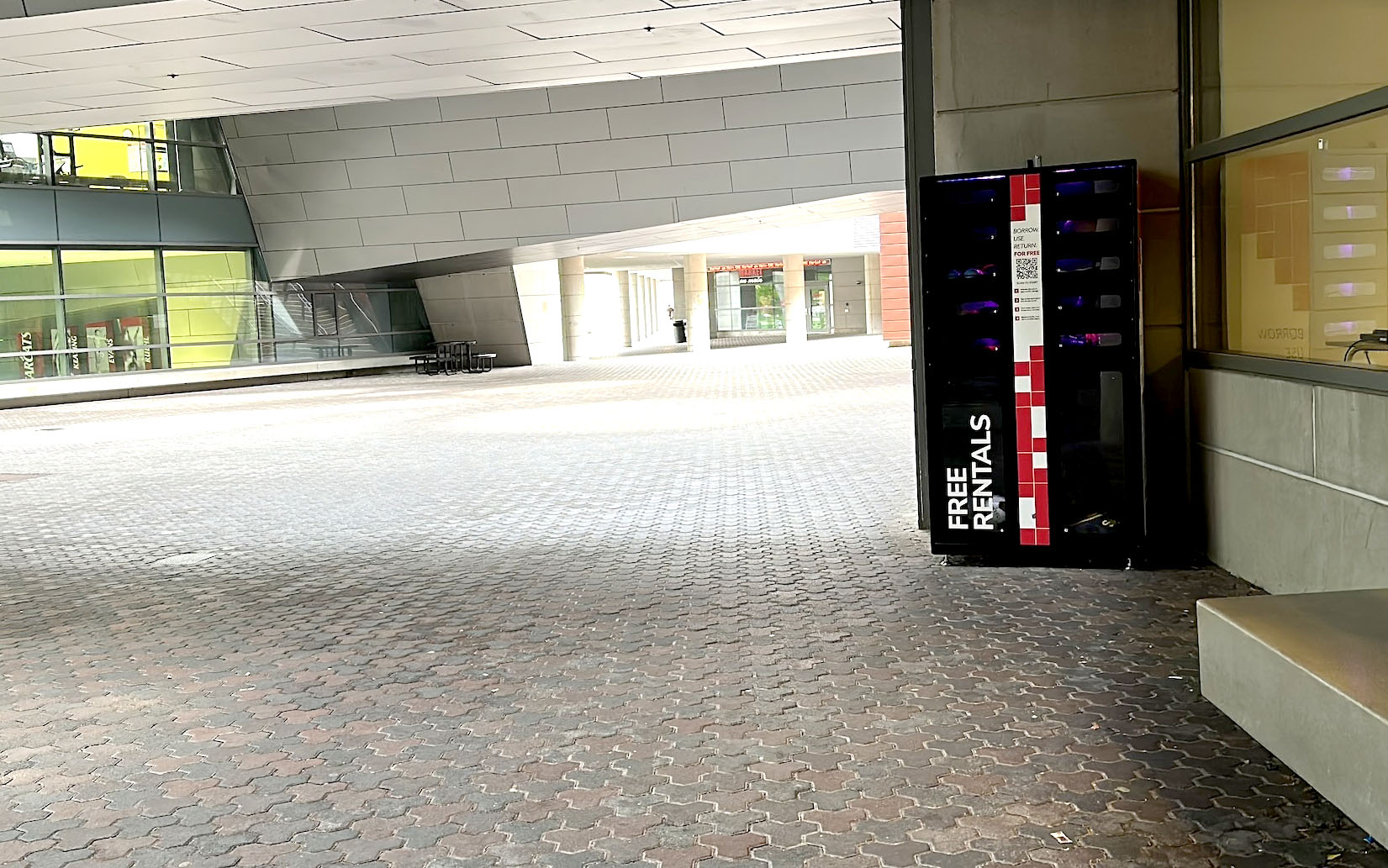 Open area under Campus Recreation building showing location of free rental lockers