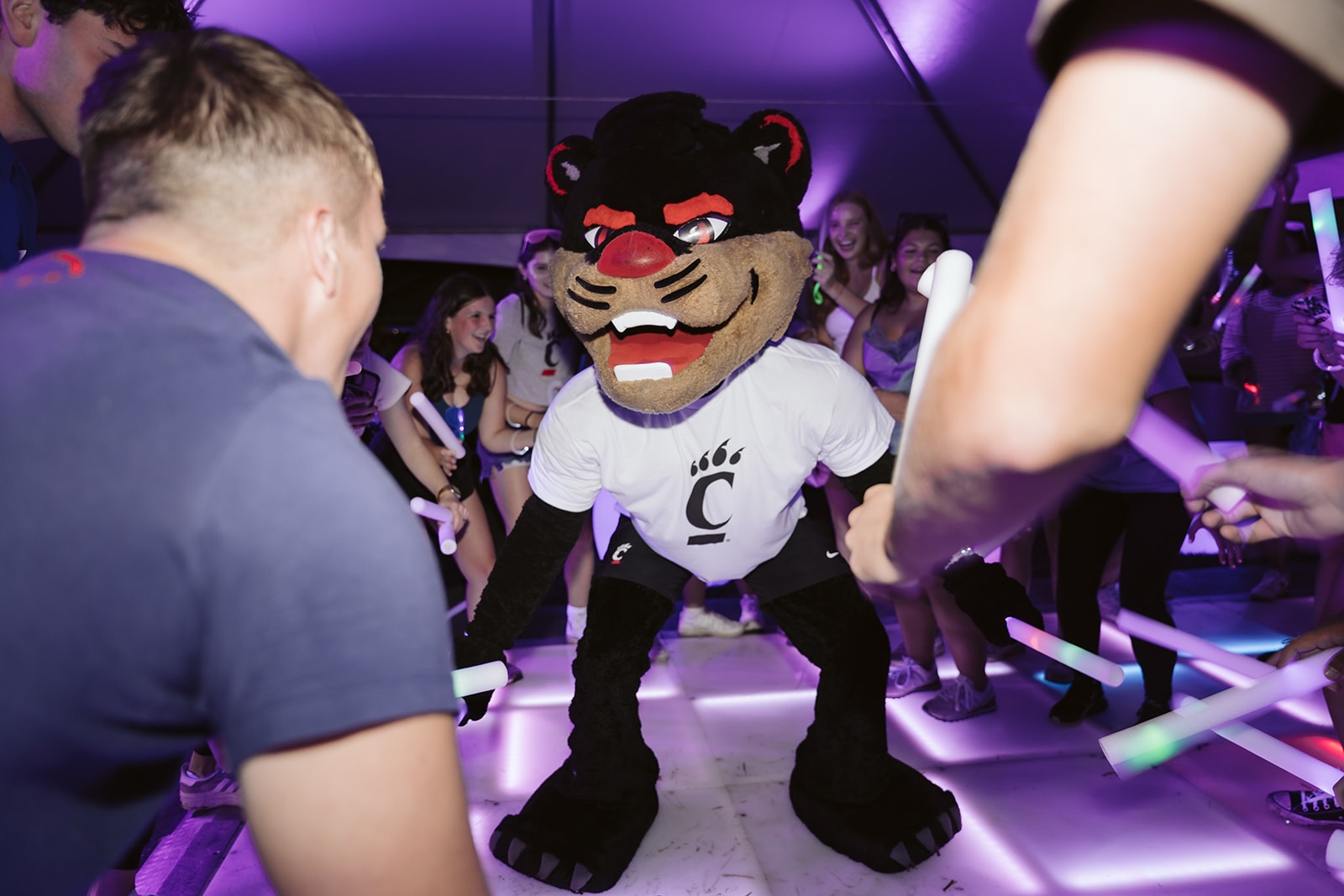 Bearcat mascot dancing on dance floor