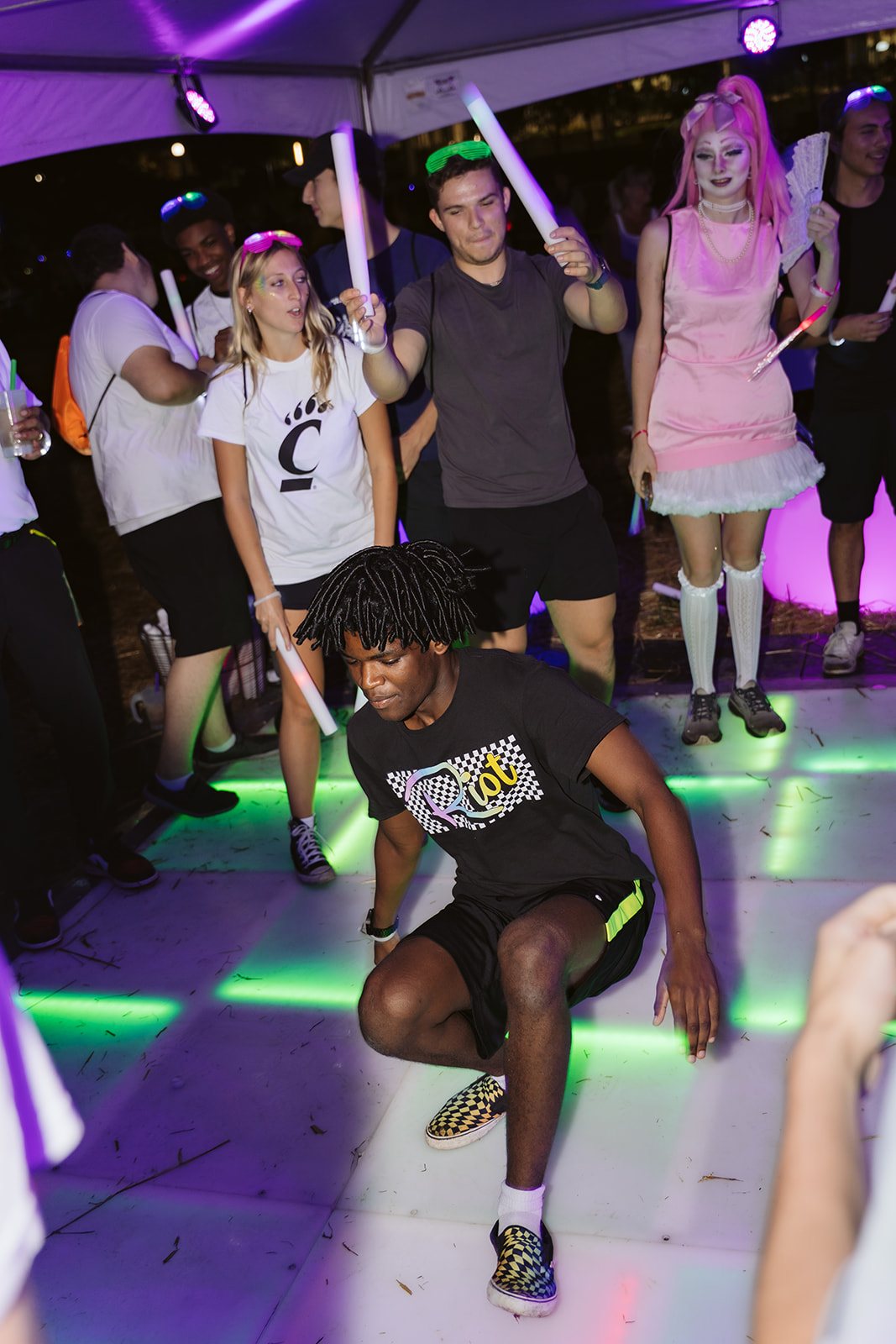 UC students dance on the dance floor