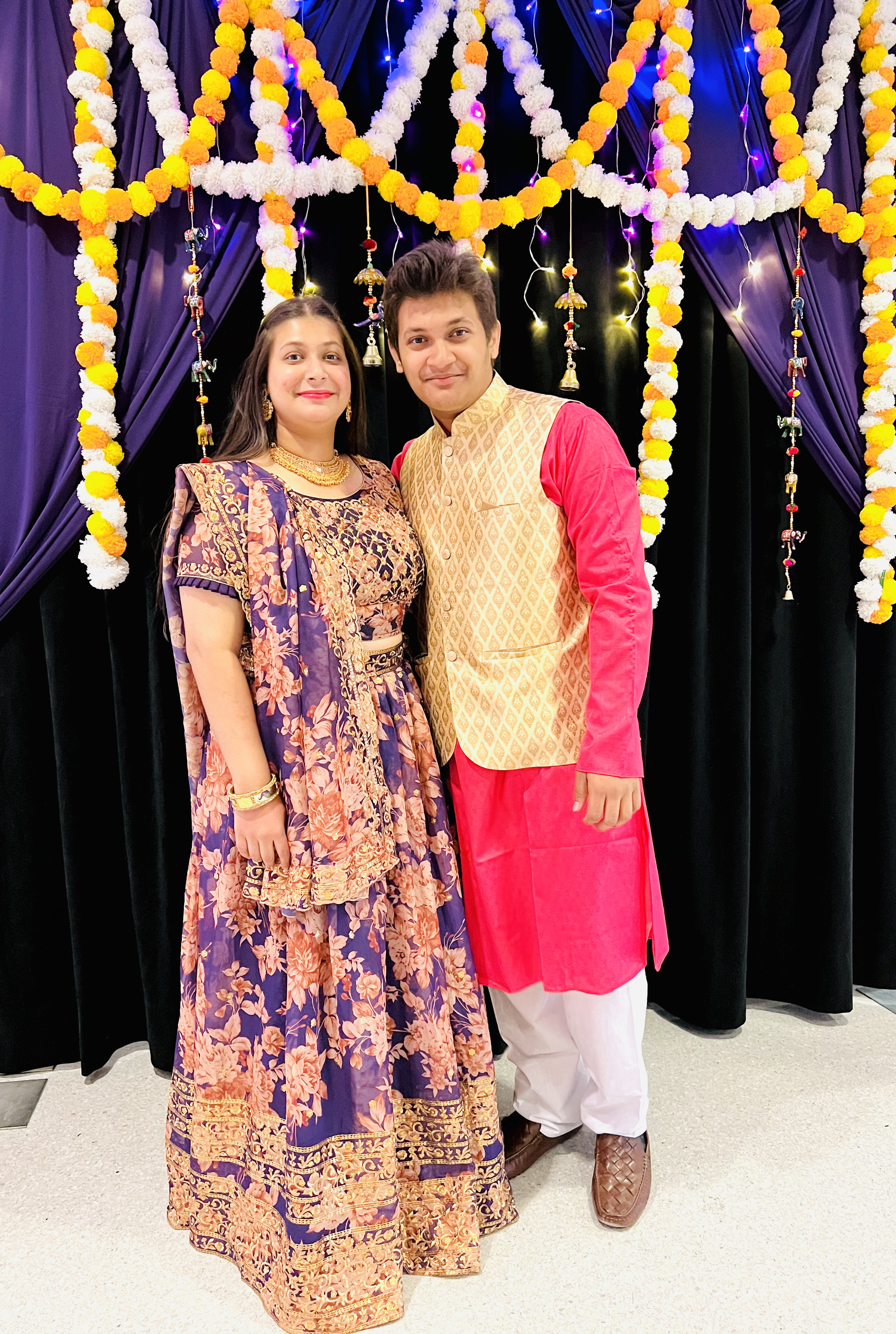 Khwahish Singh and Kartavya Singh standing together wearing traditional Indian outfits.