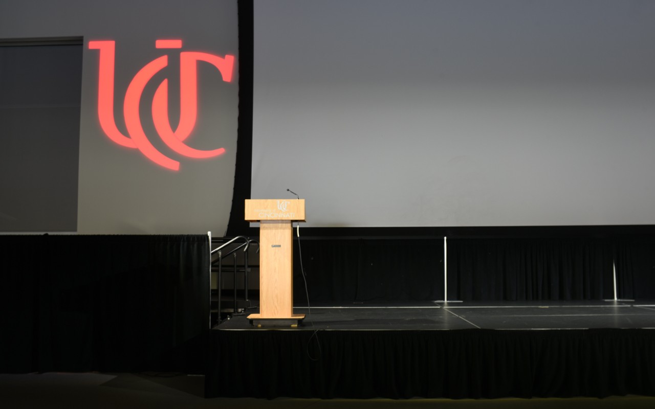 Stage with screen and podium.