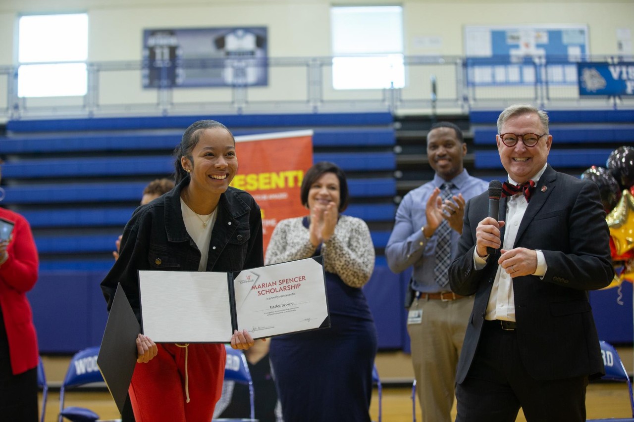 UC surprises Kailei Brown with her acceptance letter and Marian Spencer Scholarship on Decision Day.