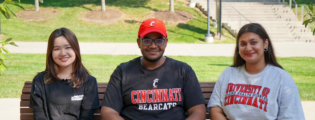 Two international students from Tanzania stand outside the University of Cincinnati's Teachers-Dyer Complex.