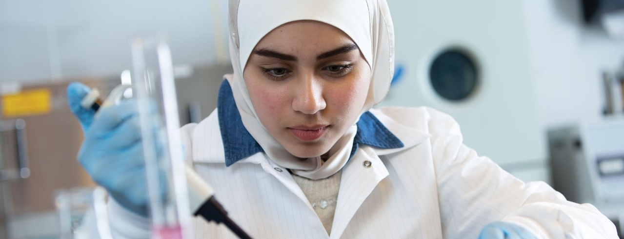 A UC Engineering student conducts research in a lab