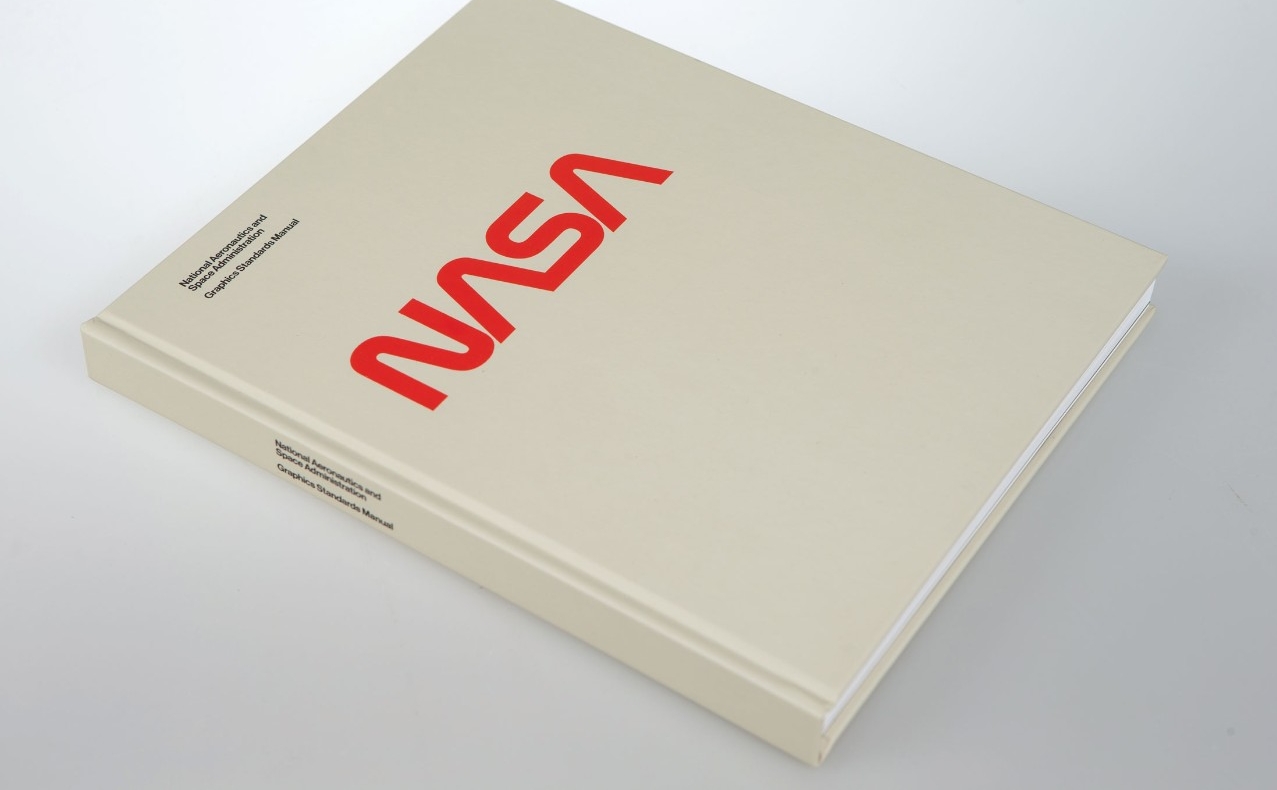 Book featuring the 1975 NASA "worm logo"