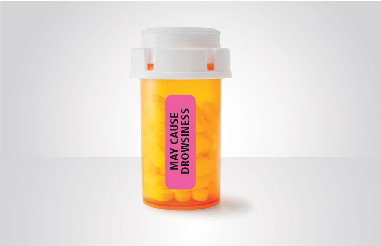 Pill bottle with warning label