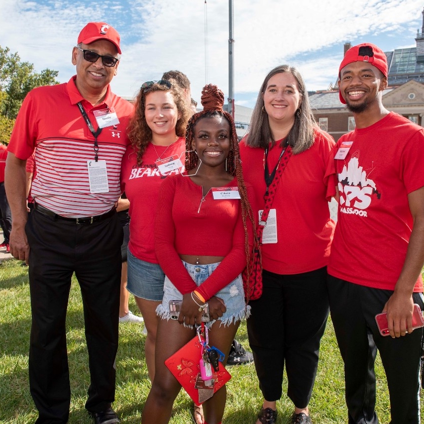 Jennifer Pinto (2017–present) with President Neville Pinto and students