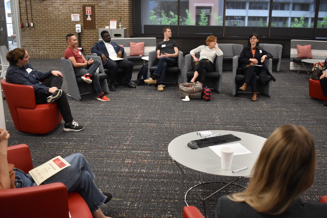 graphic of people connected by lines to create a circle