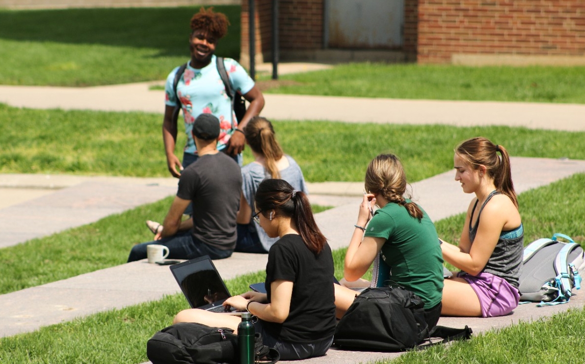 Students sitting on Sigma Sigma commons studying