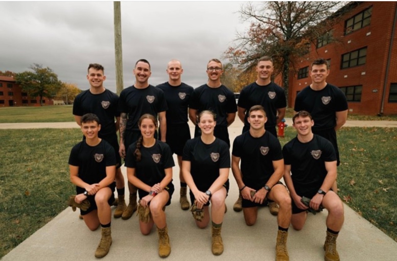 Eleven members of UC ROTC group pose for a group photo. 