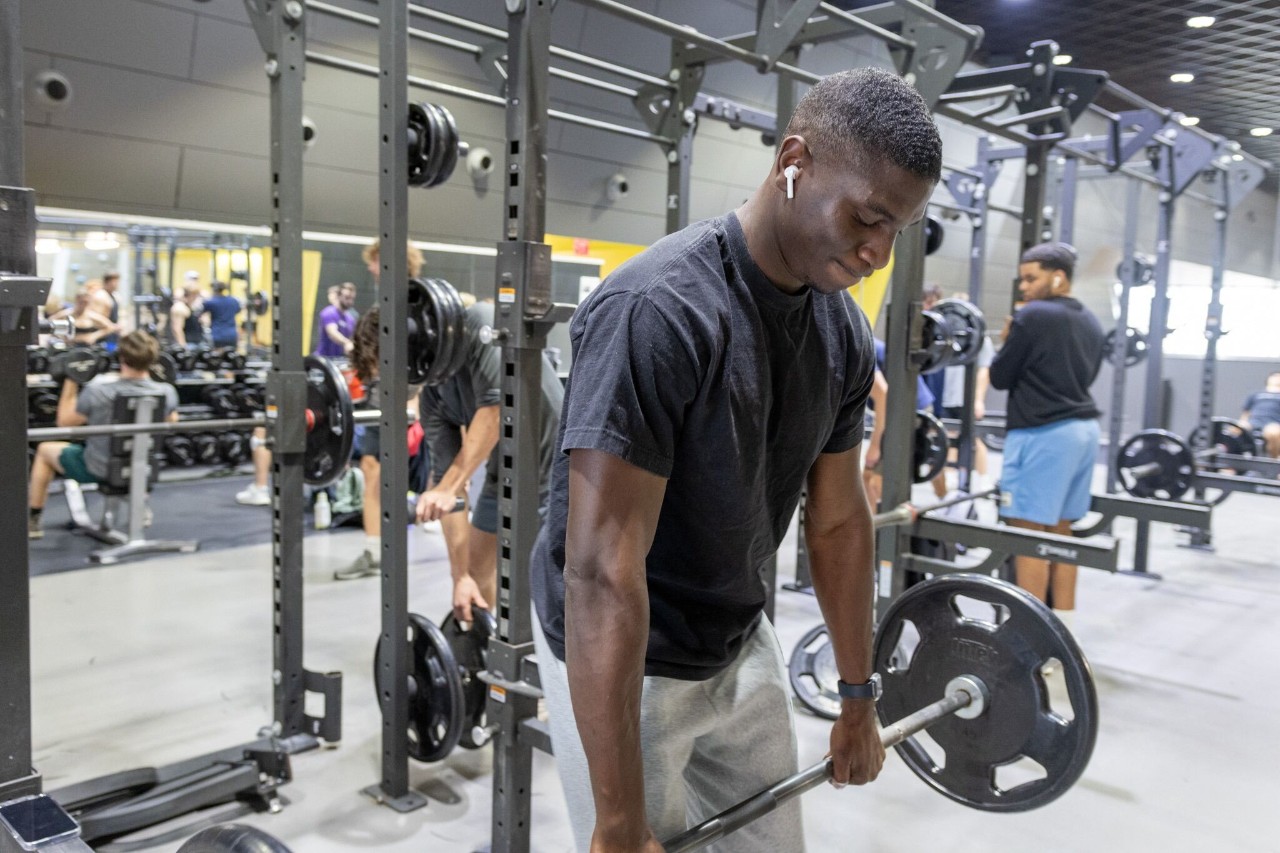 female instructor leading spinning class