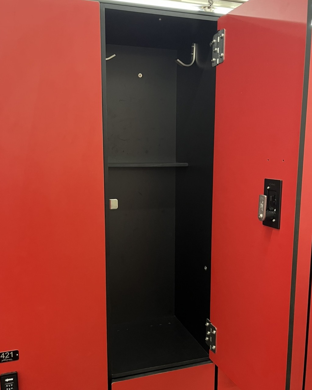 Guest opening a half locker in the CRC locker room