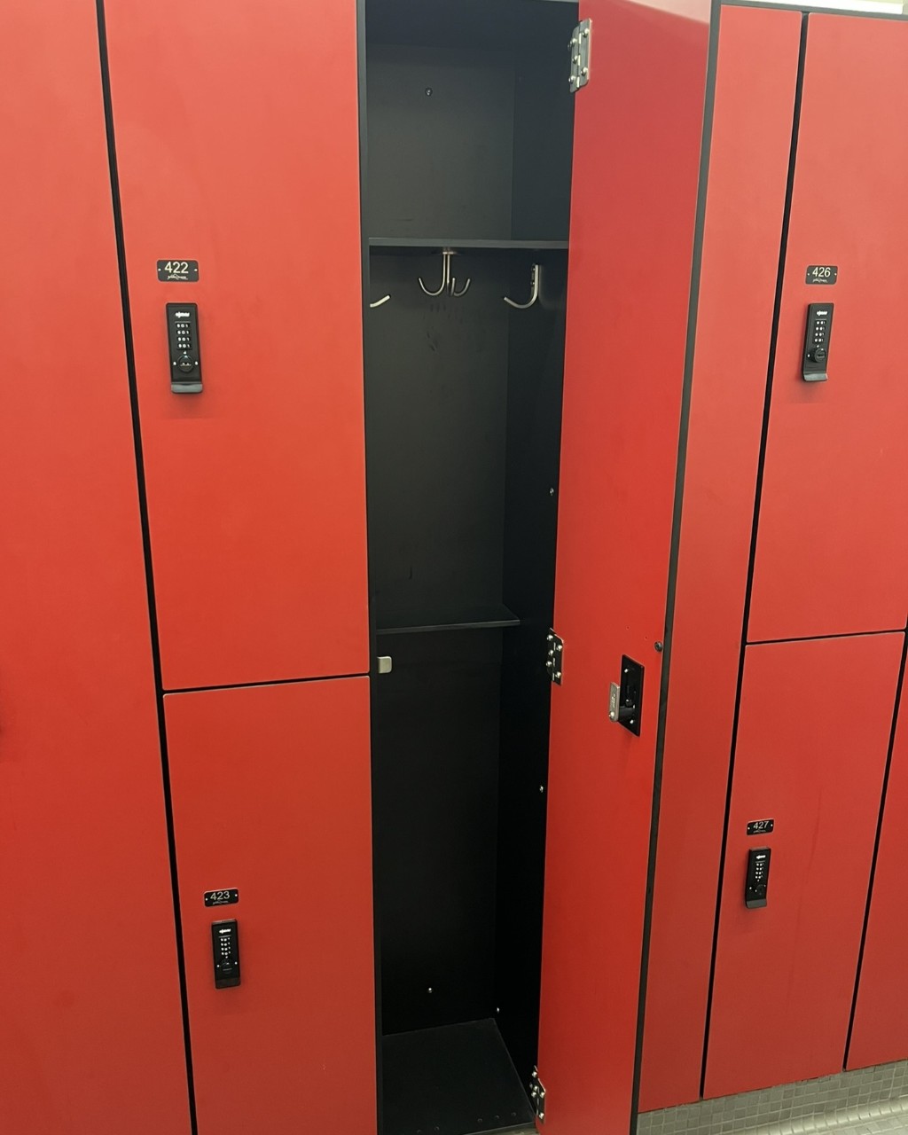 Guest opening a full-size locker in the CRC locker room