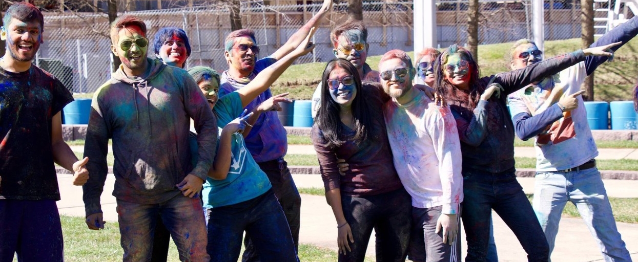 Students celebrating at the Holi Festival