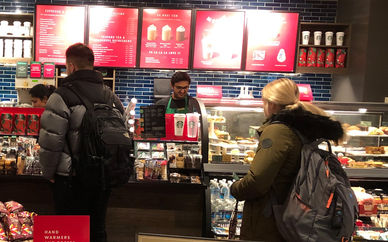 Students order at the Starbucks in the UC Medical Sciences Building.