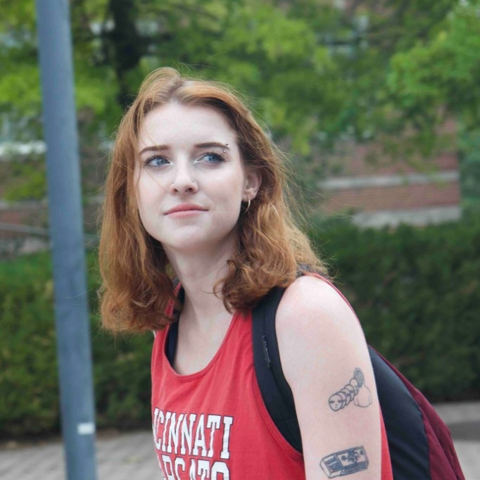 Josie Hughes Sitting on Stairs