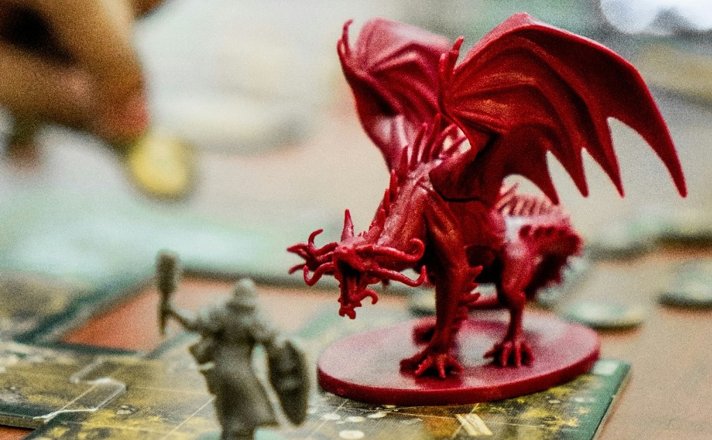 Image of a miniature dragon on a tabletop