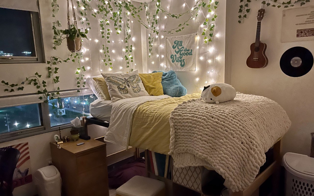 Room decorated with twinkle lights and ivy vines