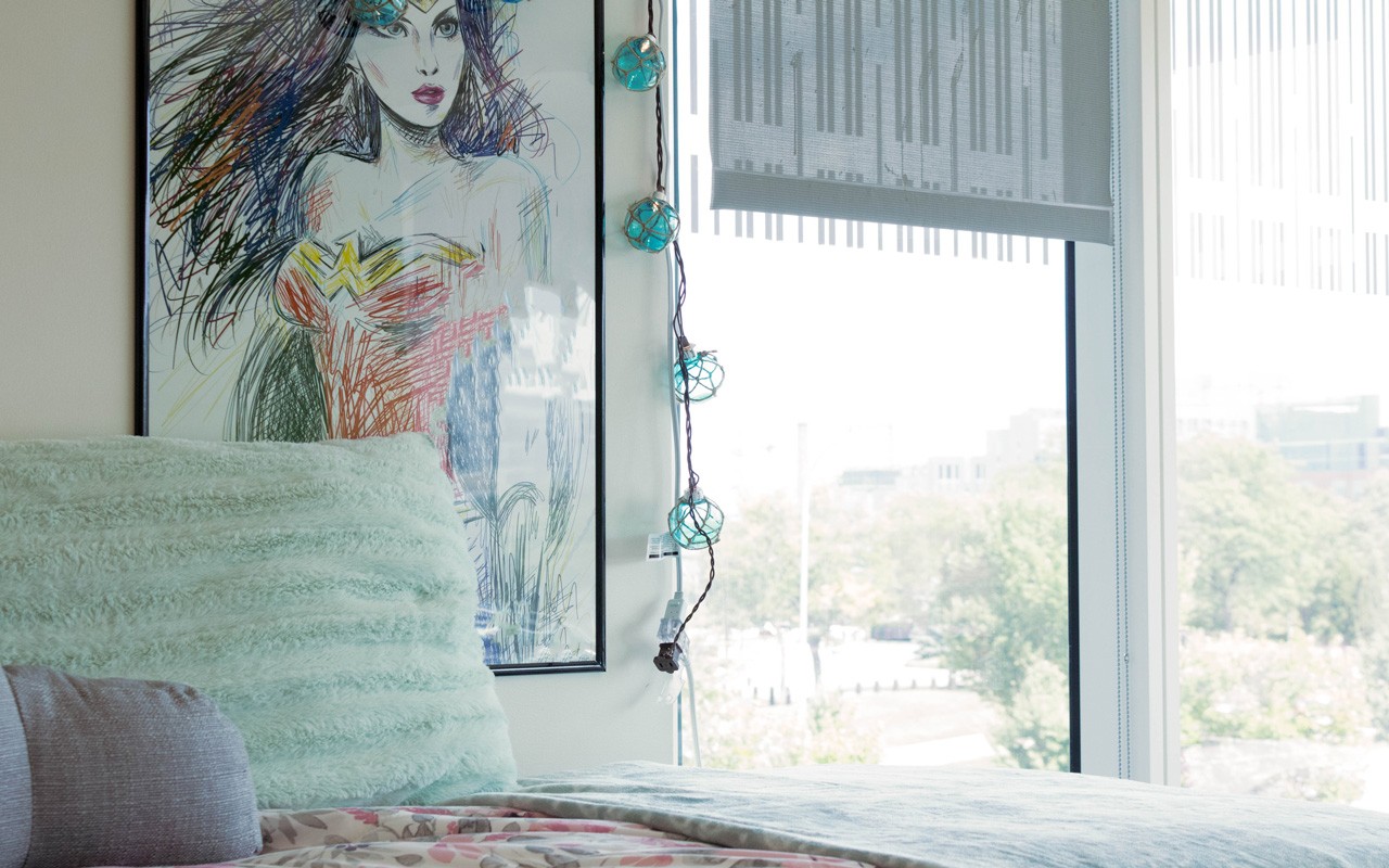 Bed and window in a Morgens Hall room.
