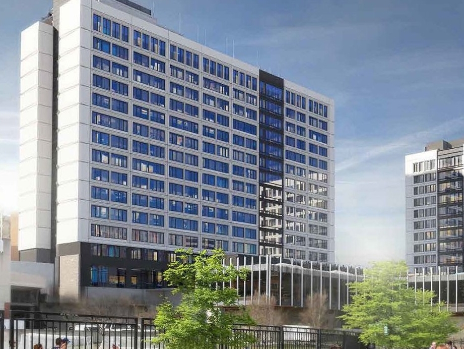 Exterior view of hi-rise Calhoun Hall looking south from Corry Blvd