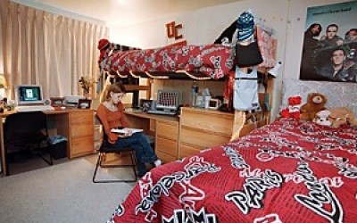 Student reading in a room in Dabney Hall.