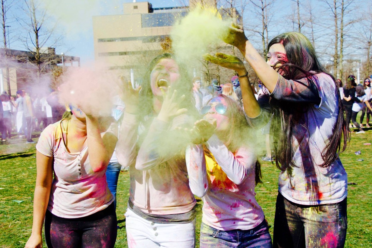 Students celebrating Holi, the festival of colors