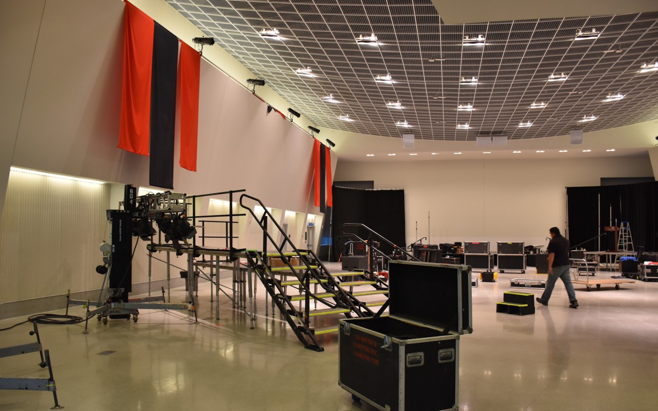 Workers setting up platforms for political rally