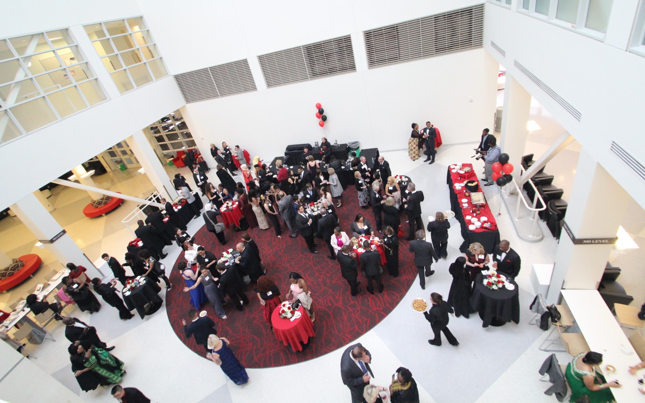 Overhead view of semi-formal reception in open atrium area.