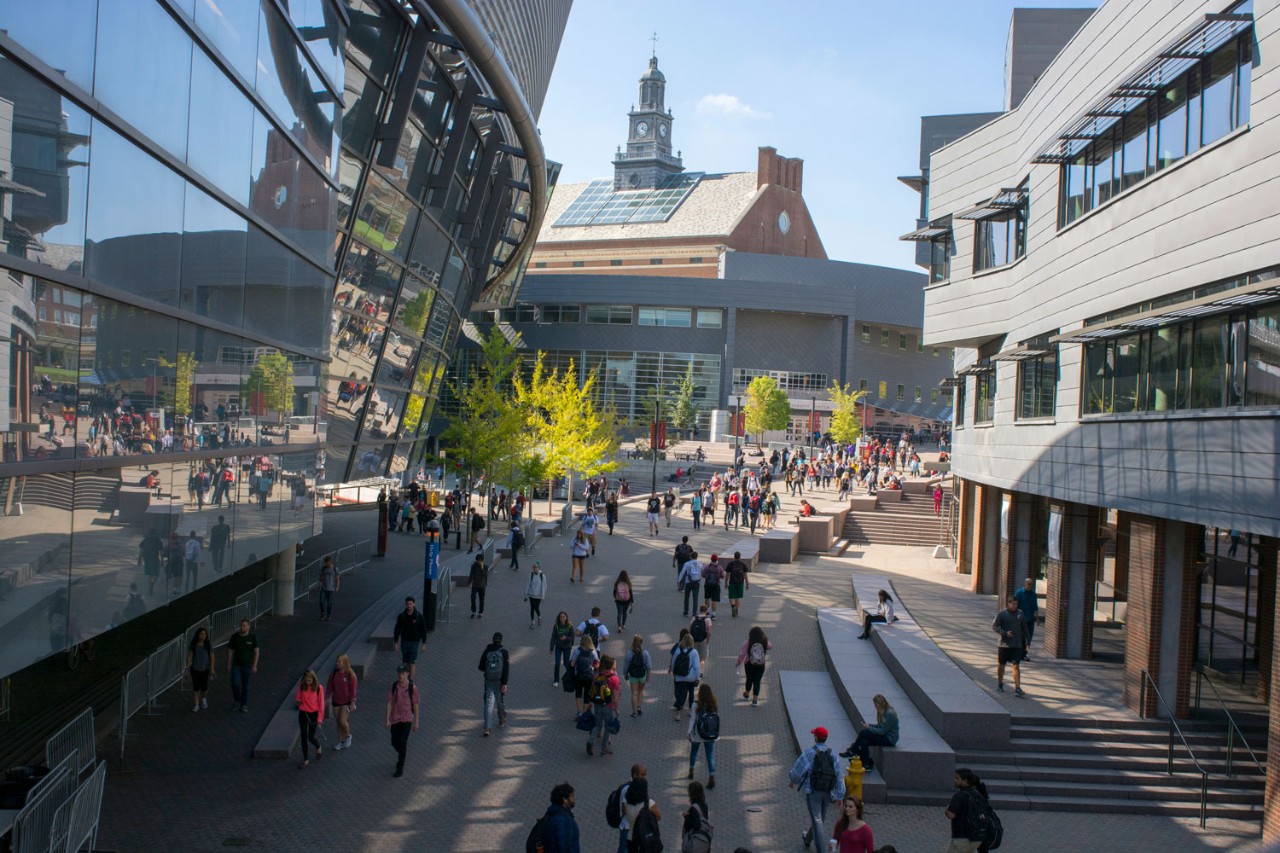 UC students walking down Mainstreet at UC's uptown campus