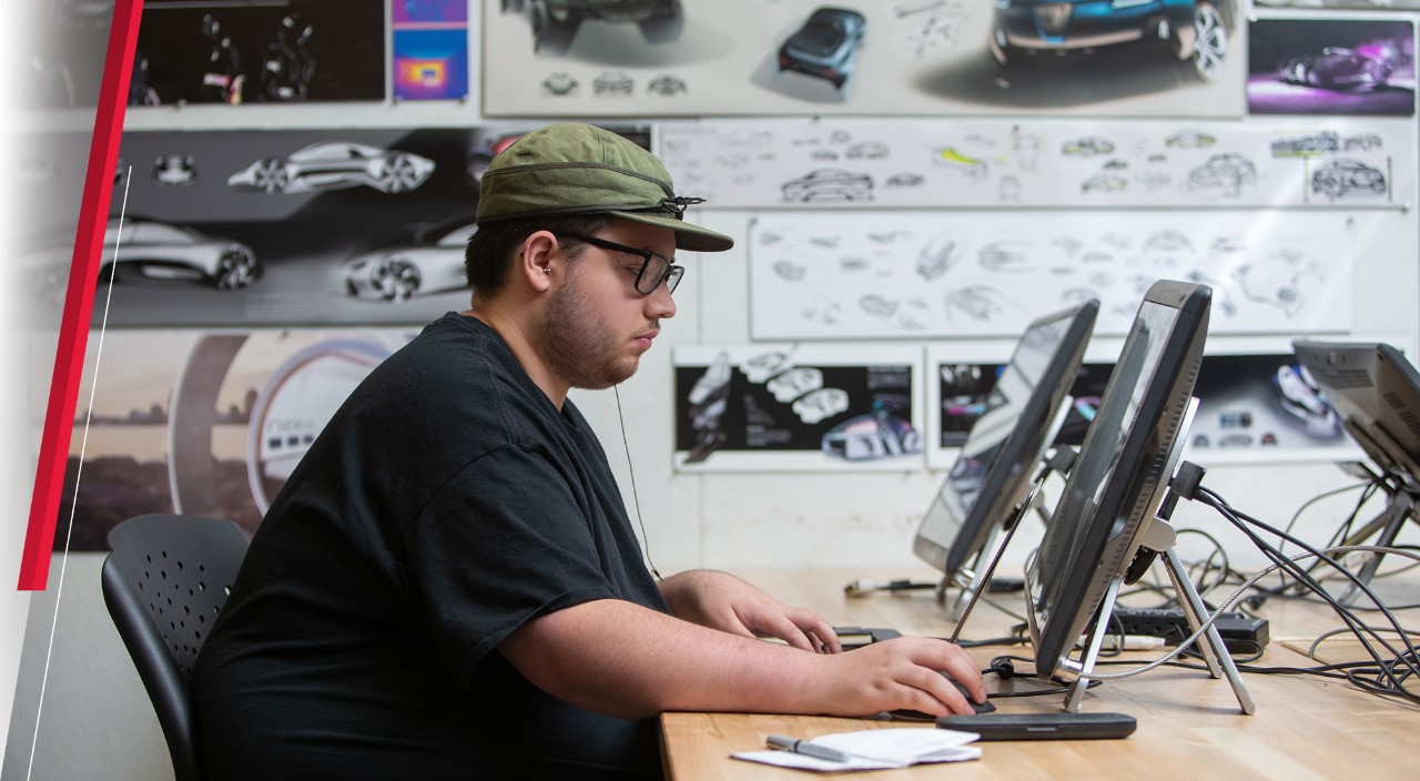 Student works on a computer