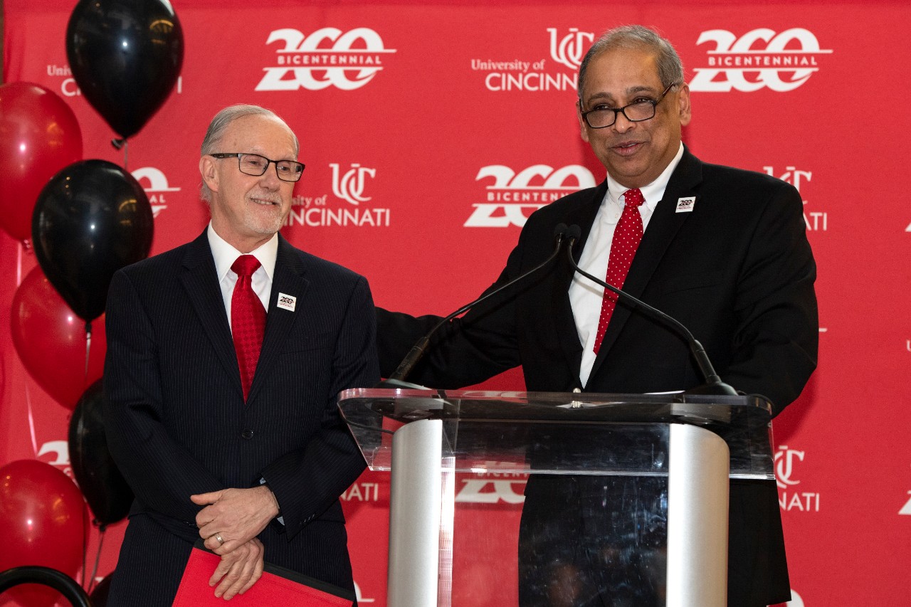 Dean Filak and President Pinto at lectern.