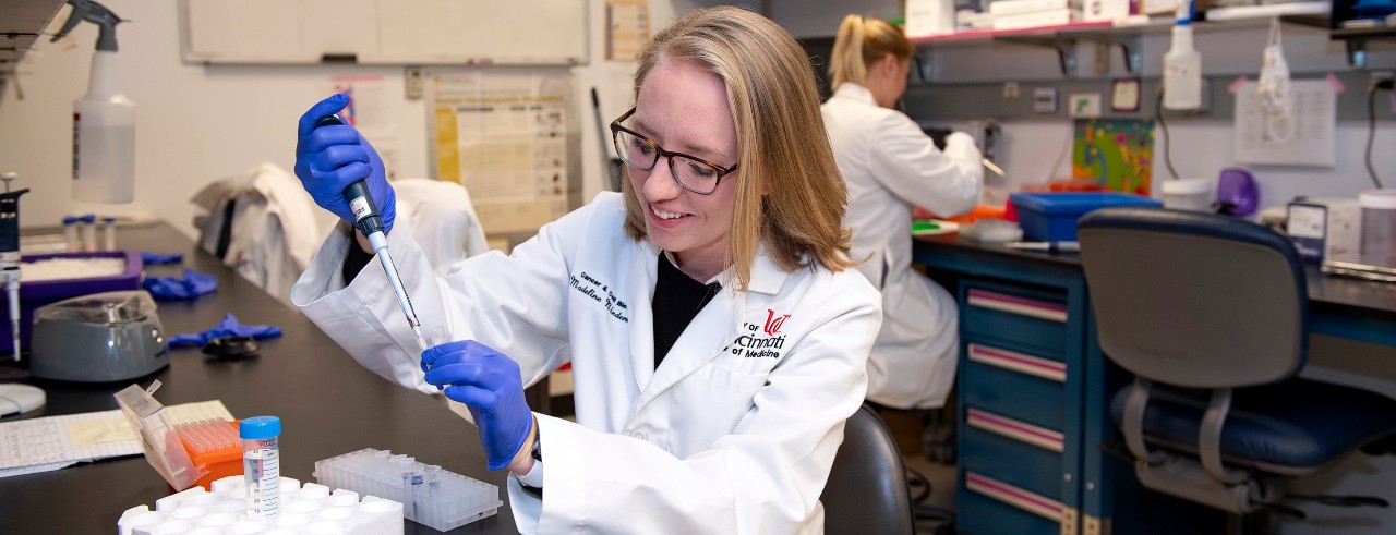 Madeline Niederkorn, a graduate student, is shown in laboratory.