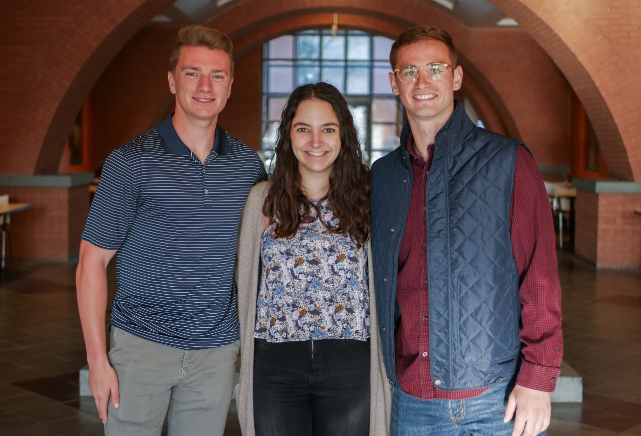 students pose in Engineering Research Center