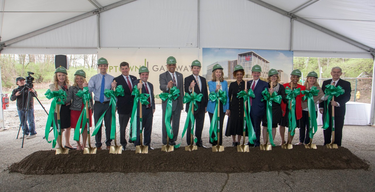 Officials with shovels at the groundbreaking event for the Uptown Gateway