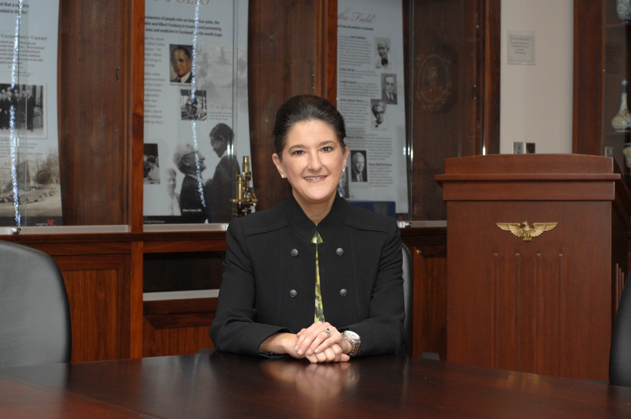 Dr. Rita Alloway seated at her desk