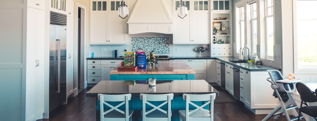 Kitchen with island and table.