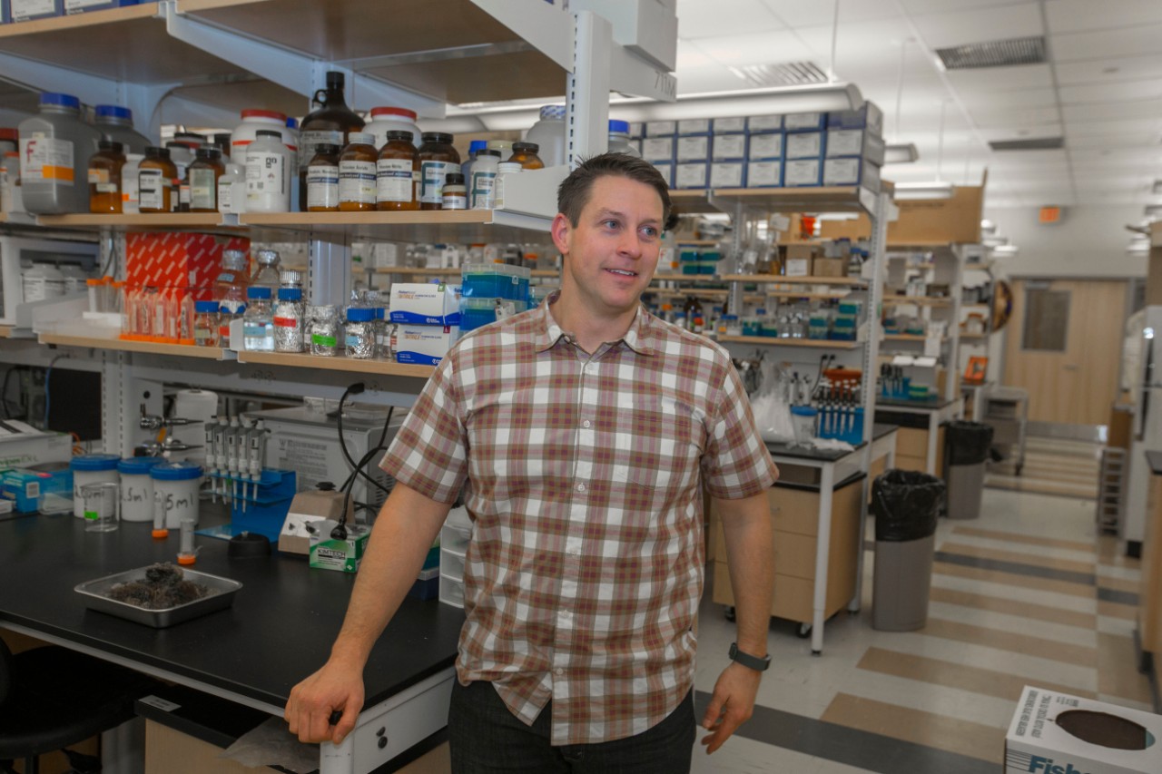 Joshua Benoit in his biology lab.