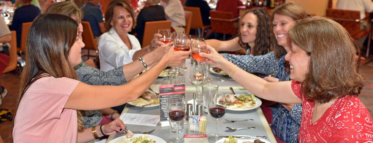 A group of women tasting wine
