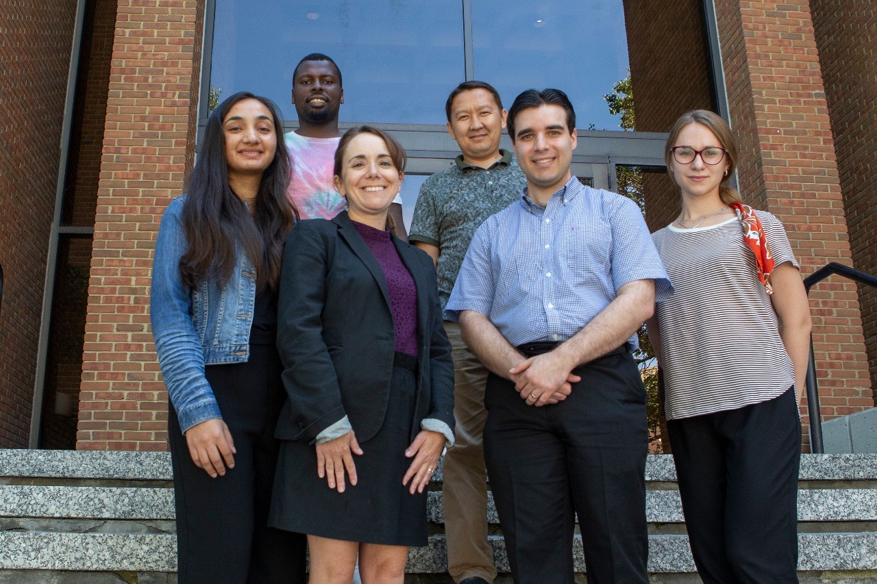 Fulbright Scholars group photo on the front stairs at the College of Law. UC/Joseph Fuqua II