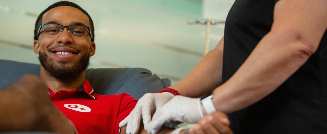 A donor gives blood at Hoxworth Blood Center