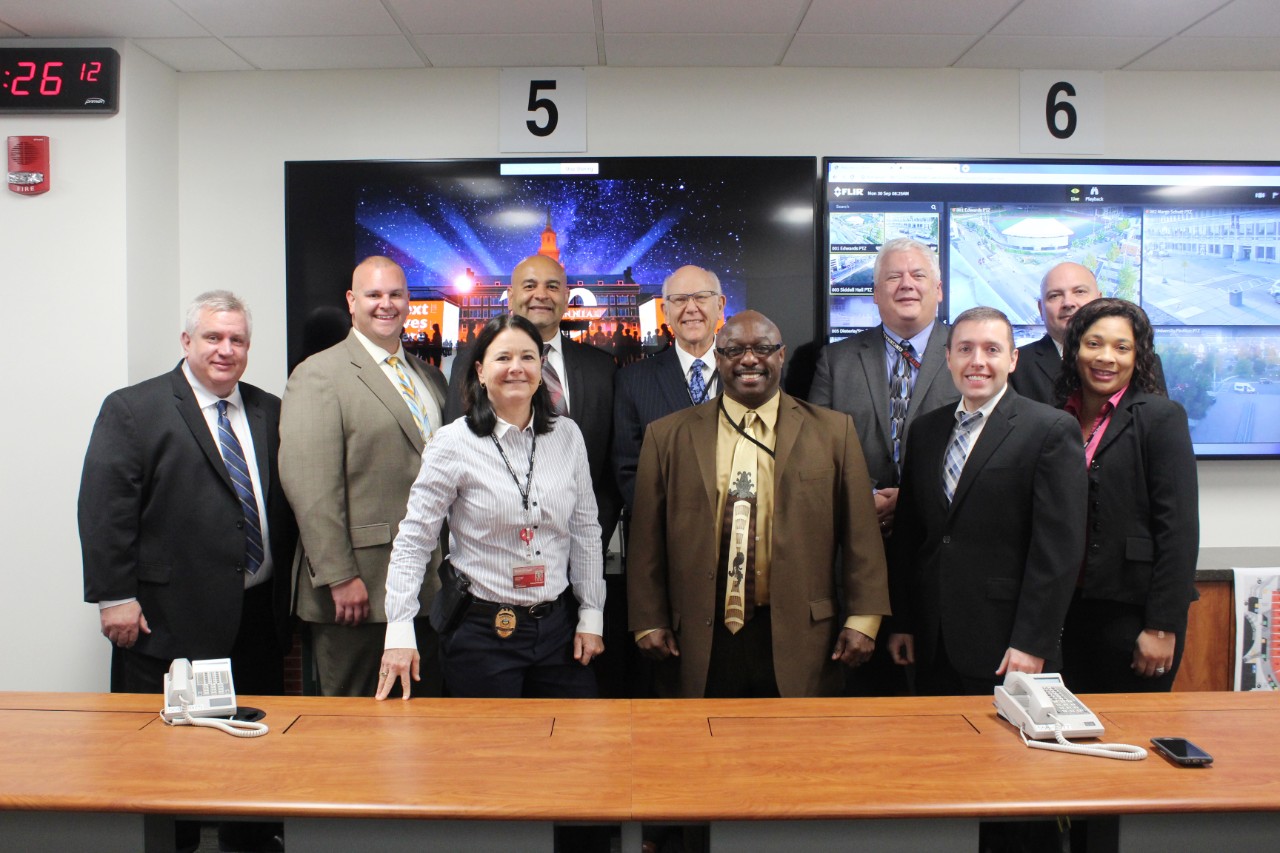 From left: Director of Emergency Management Edward Dadosky, Assistant Chief Dudley Smith, Chief Maris Herold, Organizational Development Coordinator John Dejarnette, IACLEA Lead Assessor Robert Fey, Captain Rodney Carter, Director James Whalen, Captain Dave Hoffman, Captain Jeffrey Thompson and IACLEA Assessor Tamara McCollough stand in the University of Cincinnati Emergency Operations Center on Sept. 30, 2019.