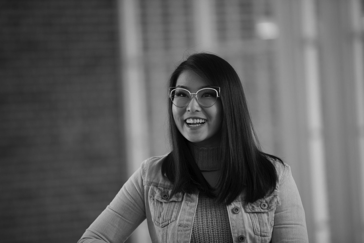Girl with glasses portrait in atrium