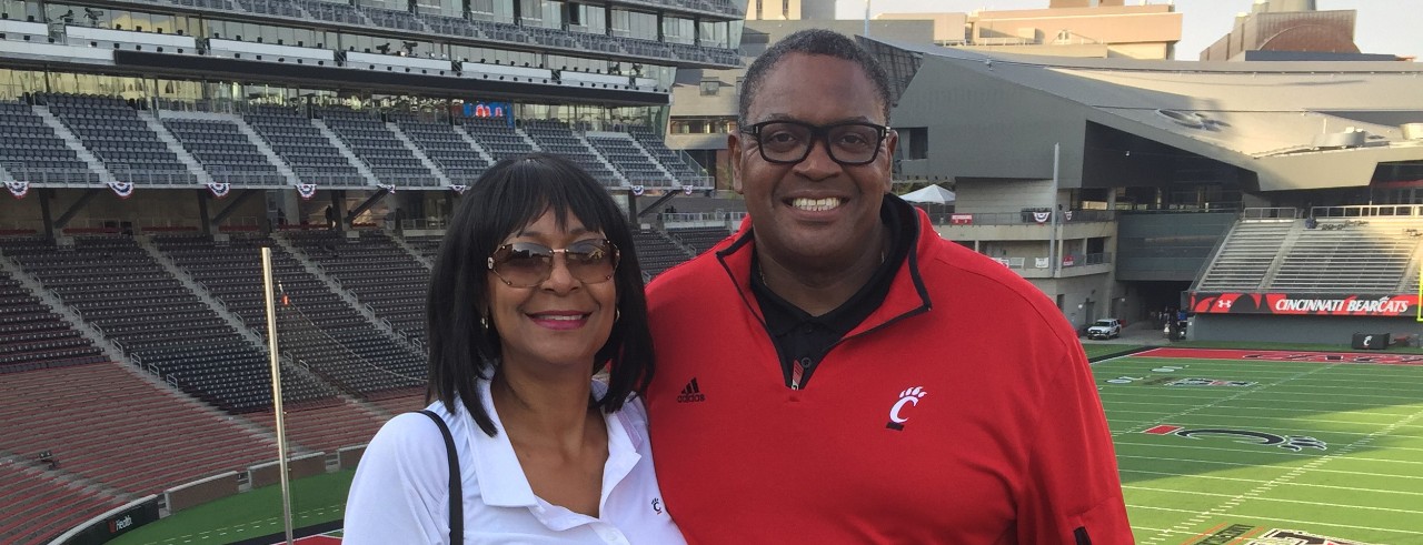 couple wearing UC shirts