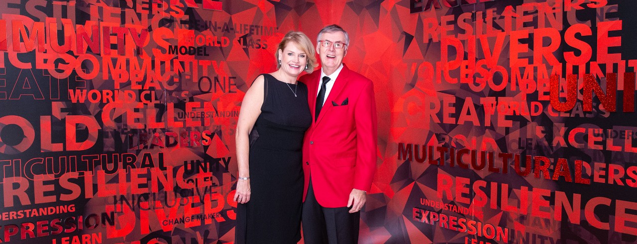 couple wearing black and red