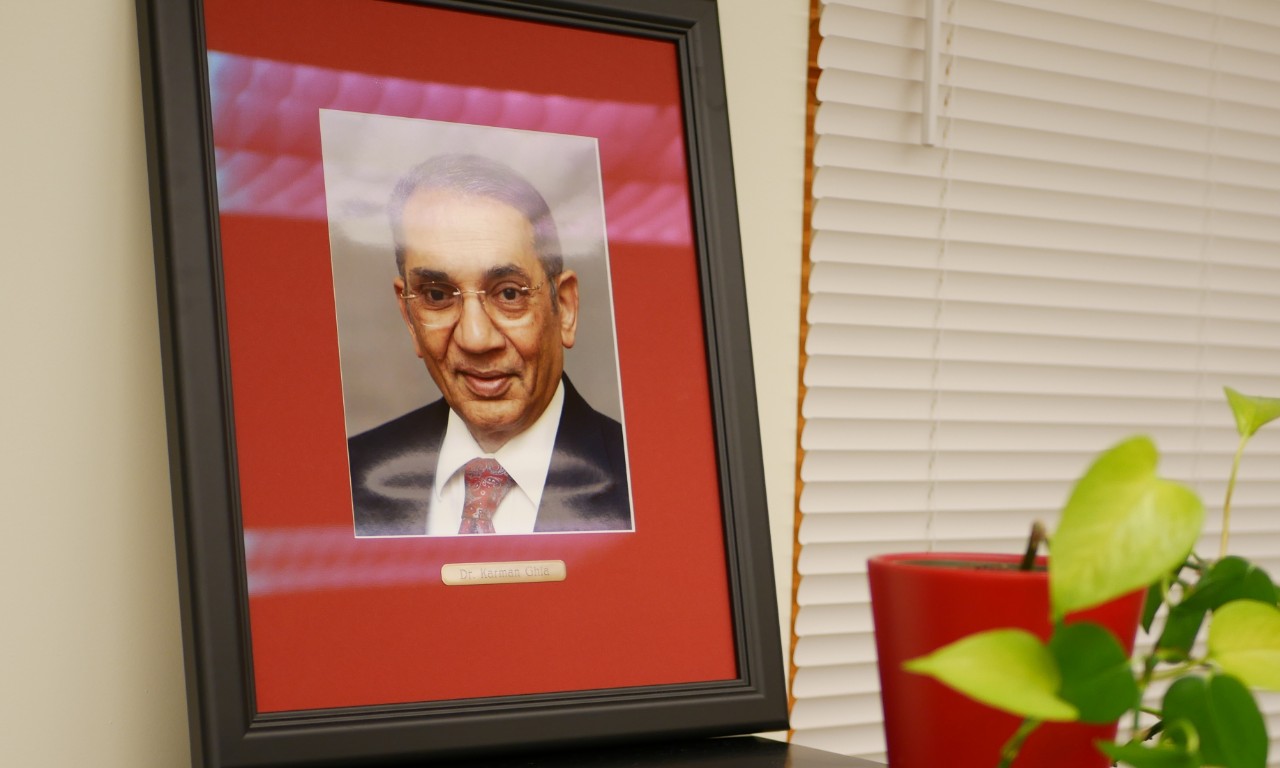 A photo of Kirti 'Karman' Ghia sits in the computational fluid dynamics lab that now bears his name in memory of his nearly 50 years at UC.