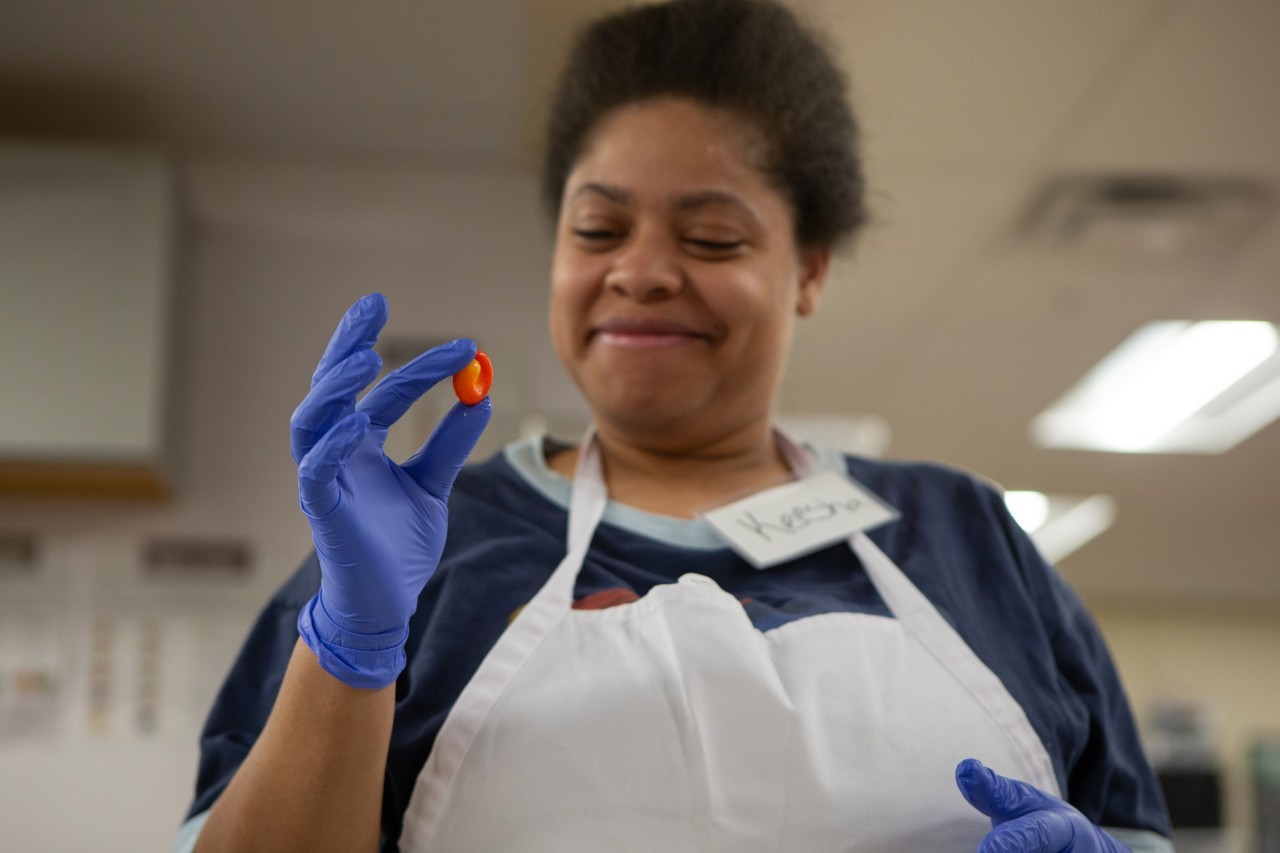 A student at Cooking for the Family The Cooking for the Family