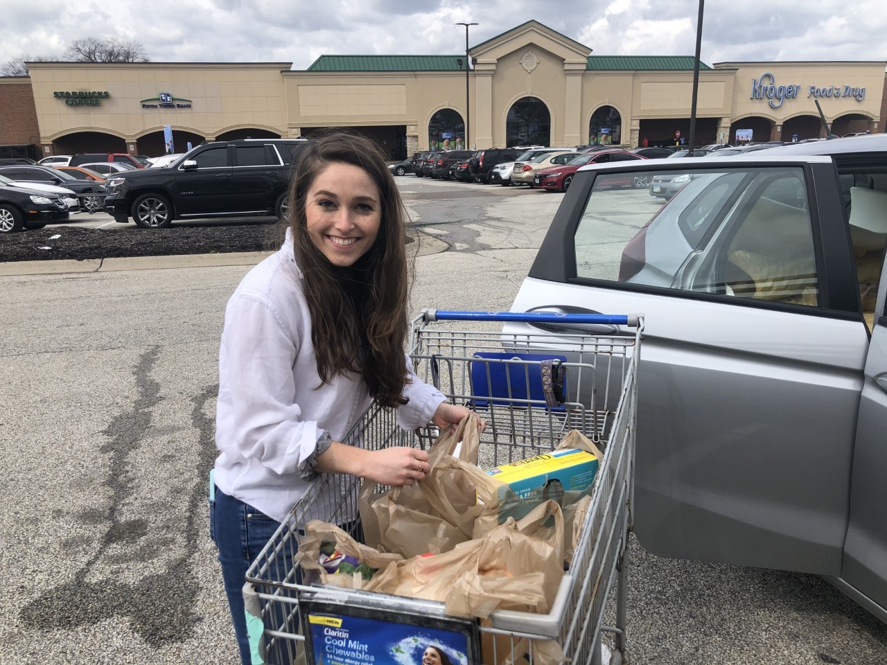 Cassandra Schoborg unpacks groceries. 