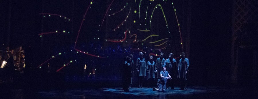 Singers on stage during a performance of L’enfant et les sortilèges