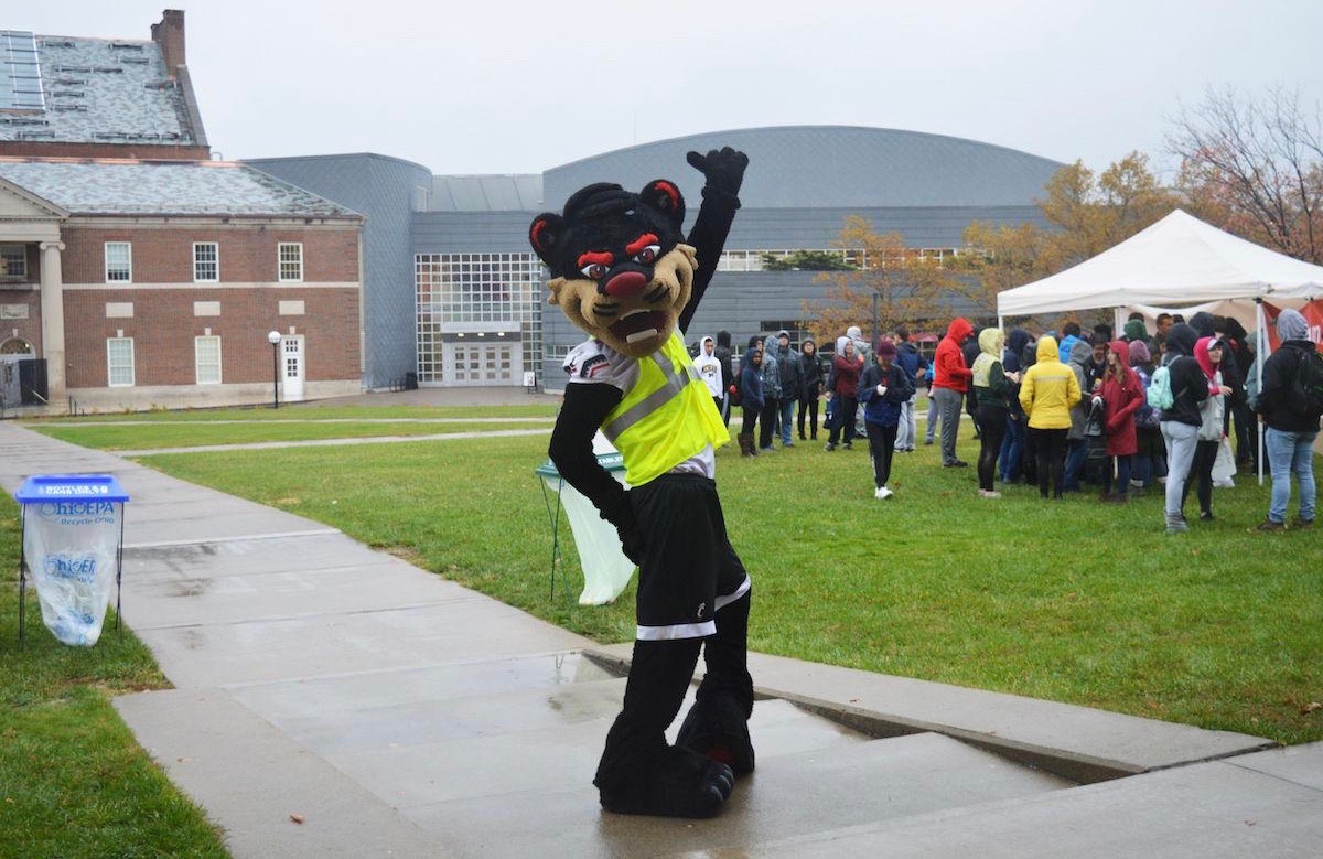 UC Bearcat stands on McMicken Commons ready for Clean-up Cincy.