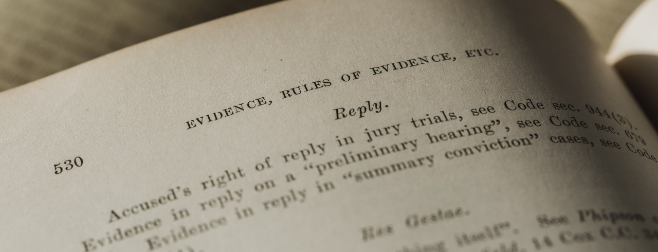 Image of law textbook with heading "evidence, rules of evidence, etc."
